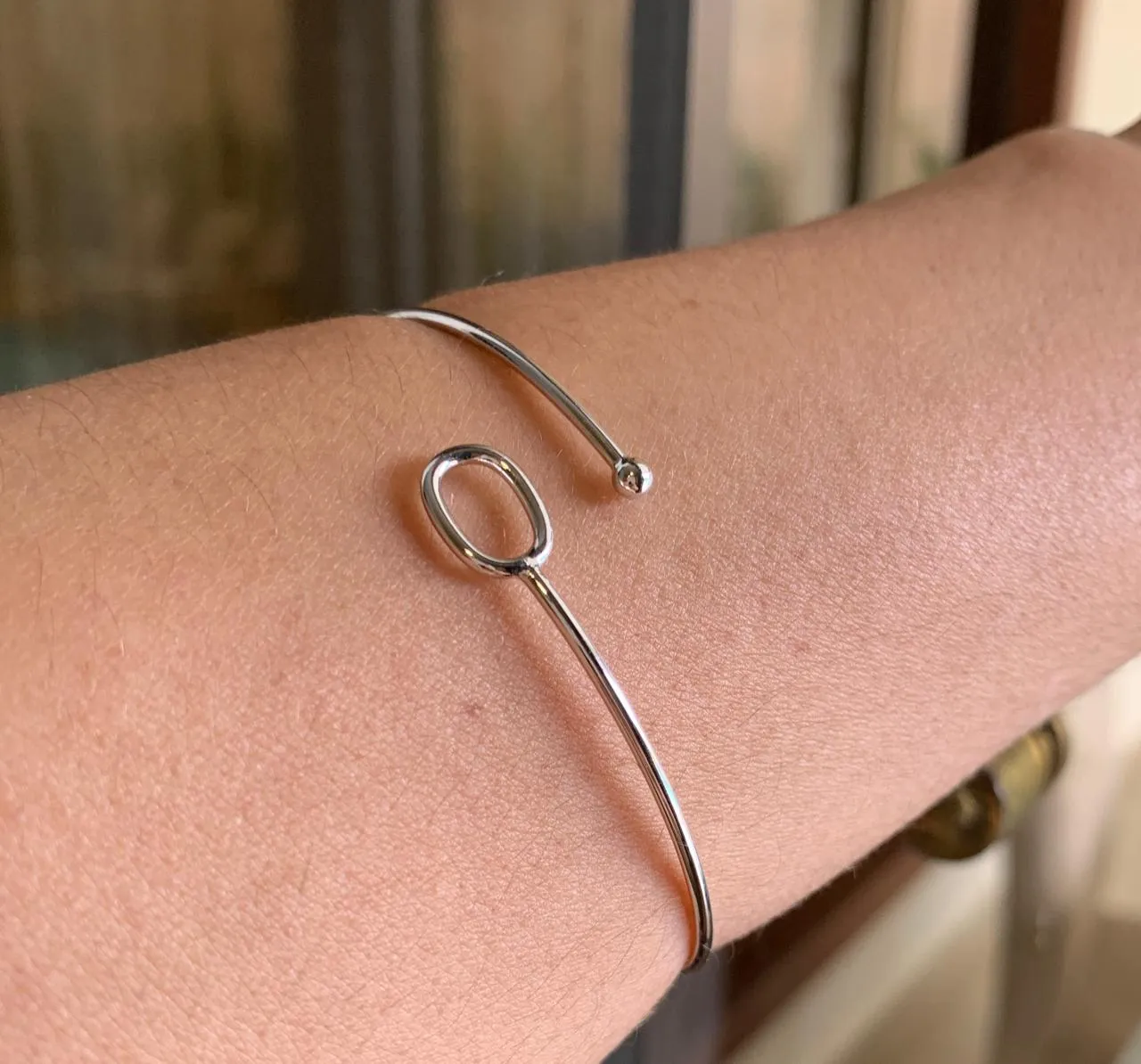 BRACELETE COM FORMA GEOMETRICA RODIO BRANCO