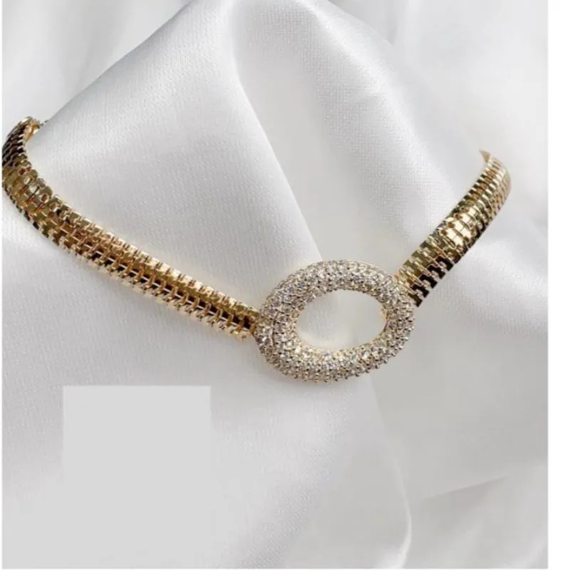 PULSEIRA MALHA PING OVAL CRAVEJADA RODIO BRANCO