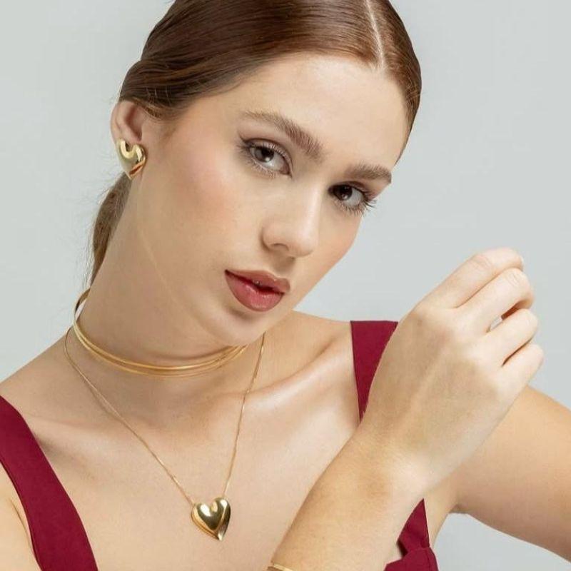 BRINCO BETINA CORACAO RODIO BRANCO COR PRATA